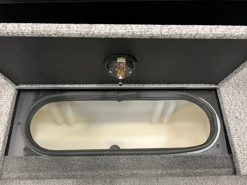Slide: The Image of 2023 Alumacraft Competitor 175 Sport livewell compartment with secure latch. - 6