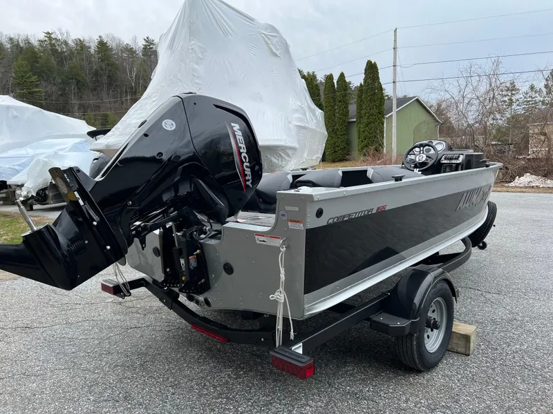 Slide: The Image of 2023 Alumacraft Competitor 165 SC boat with Mercury outboard motor on trailer. - 3