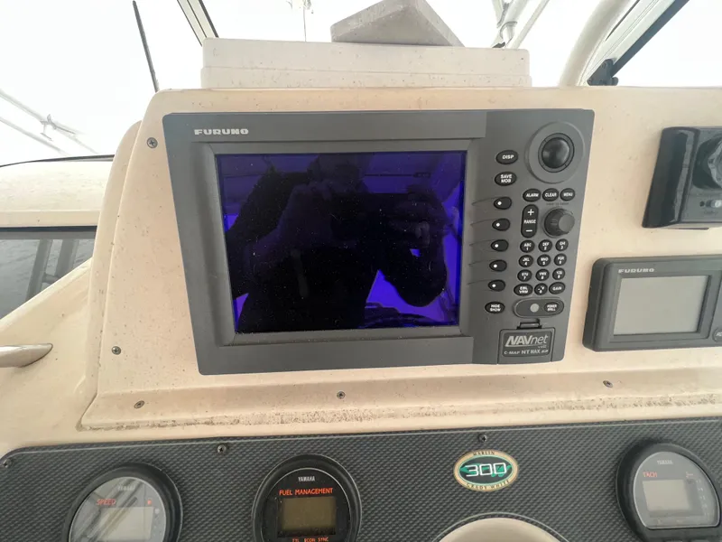 Slide: The Image of Dashboard of 2005 Grady-White Marlin 300 with Furuno navigation system. - 14