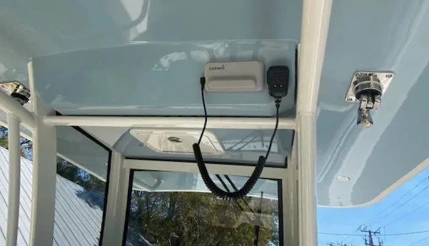 Slide: The Image of 2024 World Cat 280 CC-X boat interior with mounted Garmin radio. - 13