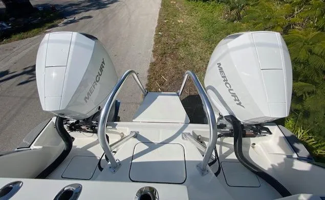 Slide: The Image of 2024 World Cat 280 CC-X boat with twin Mercury outboard engines. - 4