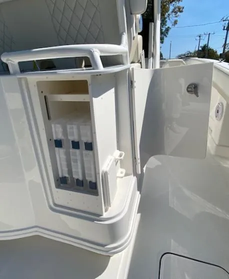 Slide: The Image of 2024 World Cat 280 CC-X storage compartment with open door. - 9