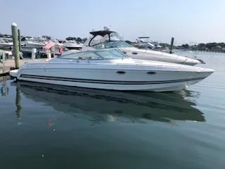 Slide: The Image of 2000 Formula 33SS boat docked in a marina. - 0