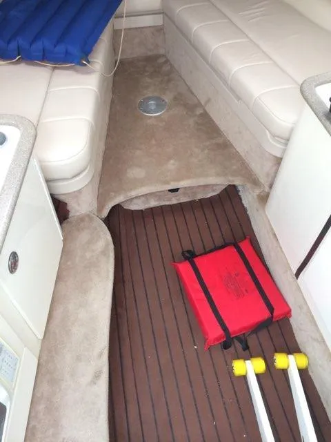 Slide: The Image of Interior of a 2000 Formula 33SS boat with seating and safety equipment. - 11