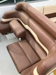 Slide: The Image of Brown leather seating on a 2000 Formula 33SS boat. - 2
