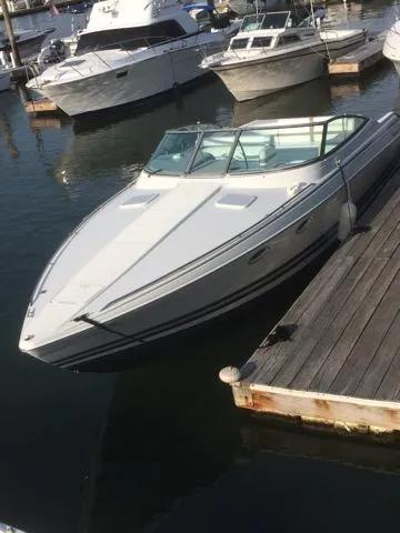 Slide: The Image of 2000 Formula 33SS speedboat docked at a marina. - 3