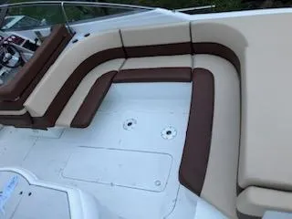 Slide: The Image of 2000 Formula 33SS boat with beige and brown seating. - 8