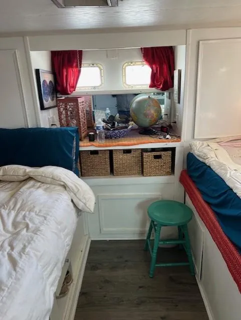 Slide: The Image of Interior of 1971 Hatteras 43 Double Cabin with cozy beds and decor. - 32