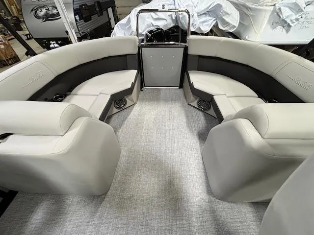 Slide: The Image of 2024 Harris Cruiser 210 CWDH pontoon boat interior with spacious seating and modern design. - 13