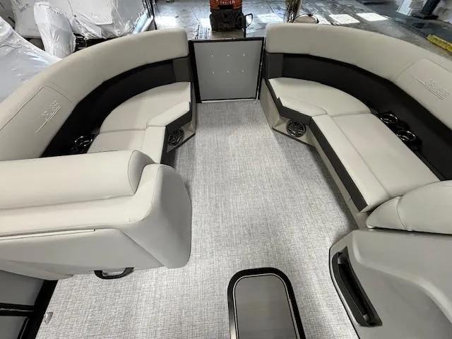 Slide: The Image of 2024 Harris Cruiser 210 CWDH boat interior with spacious seating and modern design. - 25
