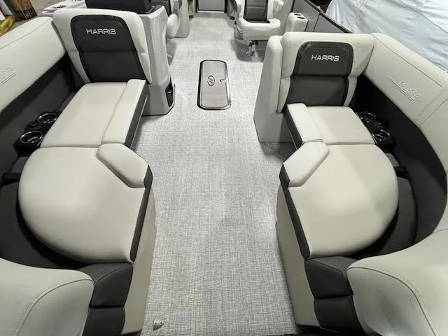 Slide: The Image of 2024 Harris Cruiser 210 CWDH interior with luxurious seating and modern design. - 8