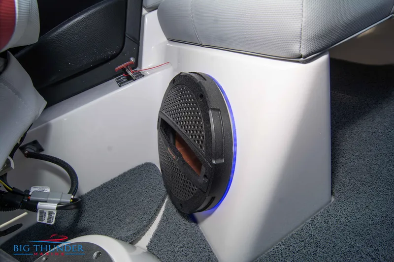 Slide: The Image of 2024 MasterCraft XT25 boat interior with speaker and Big Thunder Marine logo. - 38