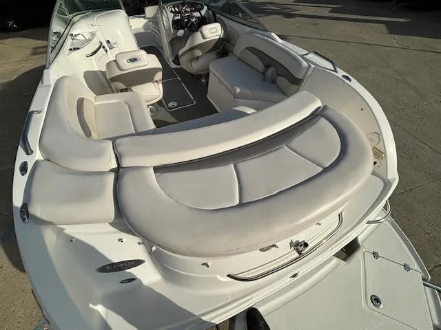 Slide: The Image of 2005 Chaparral 216 SUNSETTA boat interior with spacious seating and modern design. - 17