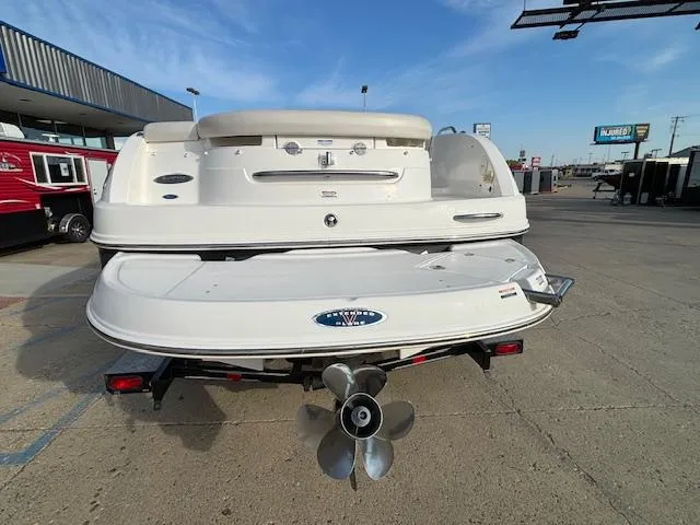 Slide: The Image of 2005 Chaparral 216 Sunsetta boat rear view with propeller and swim platform. - 3