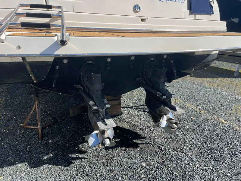 Slide: The Image of 2001 Rinker 310 Fiesta Vee boat stern with dual outboard motors. - 14