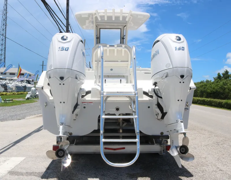 Slide: The Image of 2025 World Cat 235TE boat with twin 150 horsepower engines. - 4