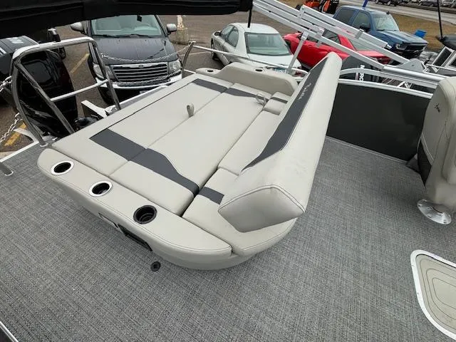 Slide: The Image of 2024 Barletta ARIA 22UC boat with adjustable seating and cup holders. - 11
