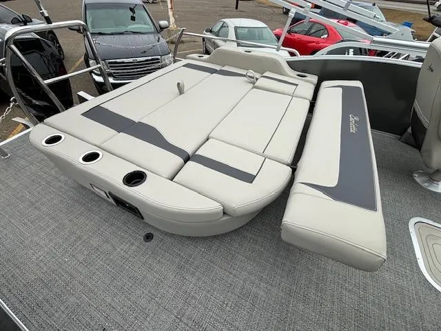 Slide: The Image of 2024 Barletta ARIA 22UC boat with spacious seating and cup holders. - 12