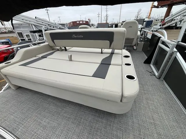Slide: The Image of 2024 Barletta ARIA 22UC pontoon boat with spacious seating and cup holders. - 13