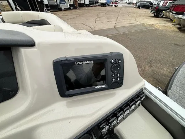 Slide: The Image of Lowrance fishfinder on 2024 Barletta ARIA 22UC boat dashboard. - 19