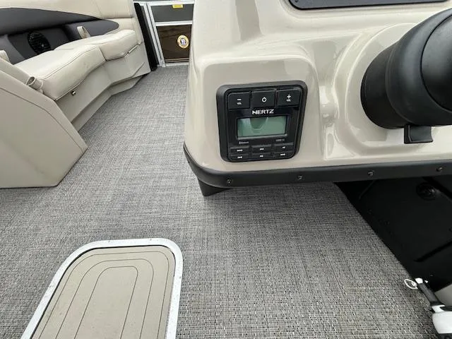 Slide: The Image of 2024 Barletta ARIA 22UC interior, featuring control panel and seating area. - 21