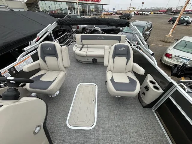 Slide: The Image of 2024 Barletta ARIA 22UC pontoon boat interior with plush seating and modern design. - 8