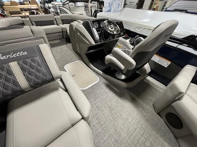 Slide: The Image of Interior of 2024 Barletta Lusso 23M pontoon boat with luxurious seating and modern helm. - 20