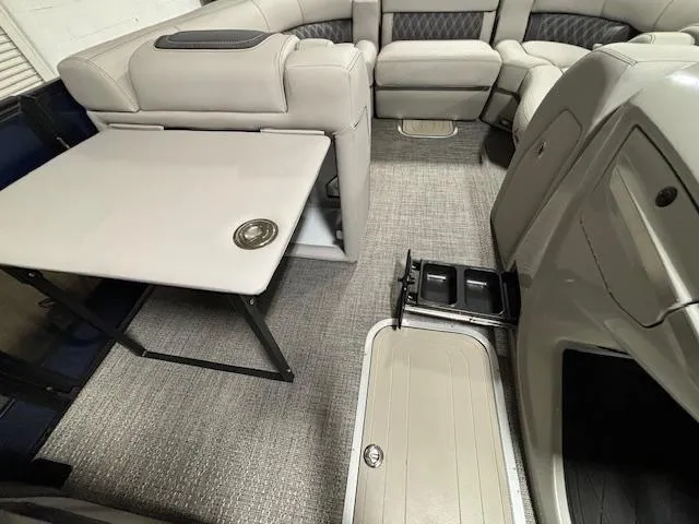 Slide: The Image of Interior of 2024 Barletta Lusso 23M pontoon boat with seating and table. - 26