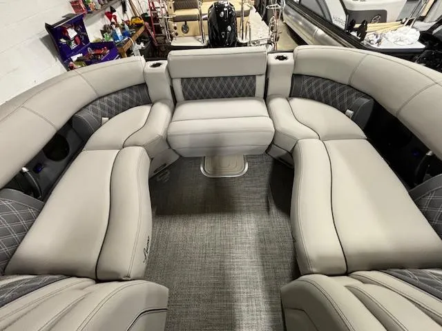 Slide: The Image of 2024 Barletta Lusso 23M luxury pontoon boat interior with plush seating and modern design. - 28