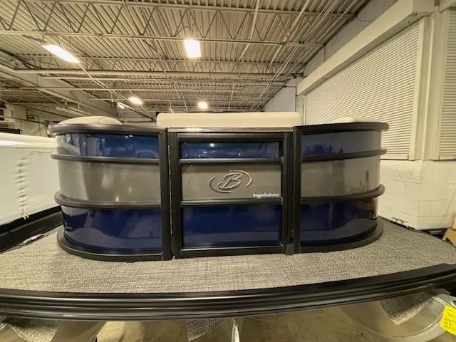 Slide: The Image of 2024 Barletta Lusso 23M pontoon boat in showroom, front view. - 3