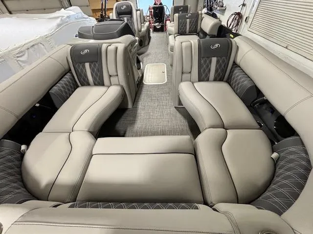 Slide: The Image of 2024 Barletta Lusso 23M luxury pontoon boat interior with plush seating. - 4