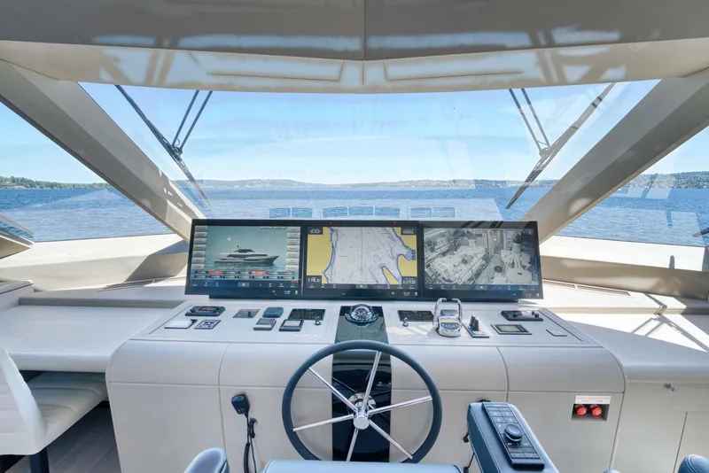 Slide: The Image of Modern helm station of 2024 Ocean Alexander 32L yacht with advanced navigation systems. - 25
