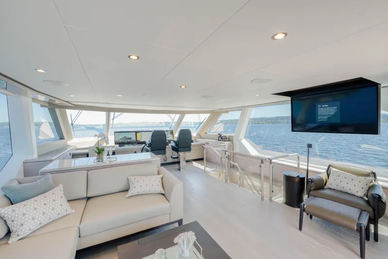Slide: The Image of Luxurious interior of 2024 Ocean Alexander 32L yacht with panoramic windows and modern furnishings. - 29