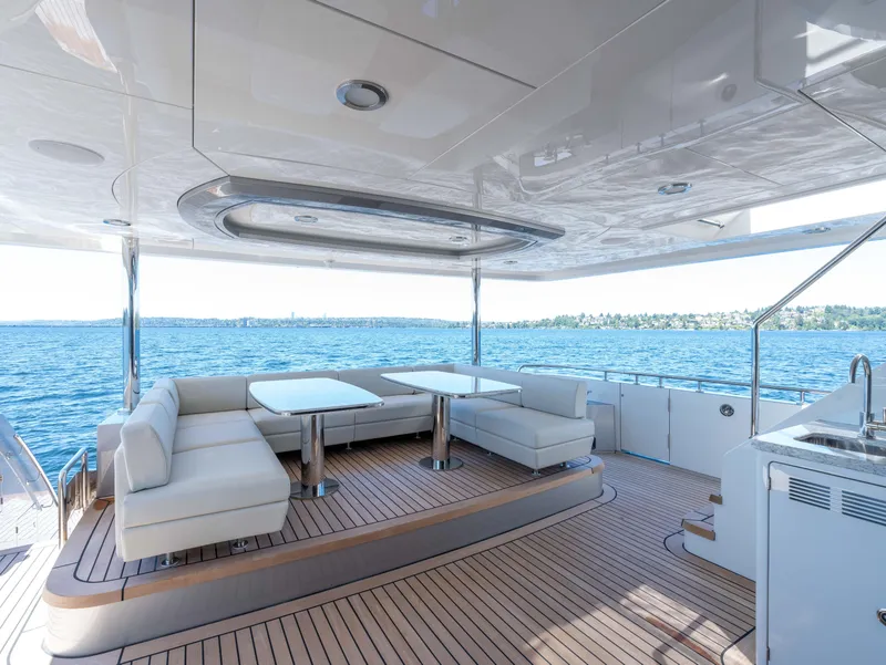 Slide: The Image of Luxurious deck of 2024 Ocean Alexander 32L yacht with modern seating and ocean view. - 35