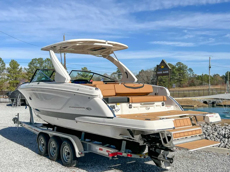 Slide: The Image of 2024 Chaparral 307 SSX boat on trailer, sunny day. - 10