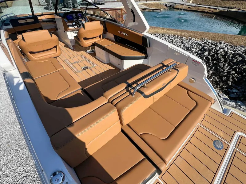Slide: The Image of Interior of 2024 Chaparral 307 SSX with luxurious leather seating. - 15