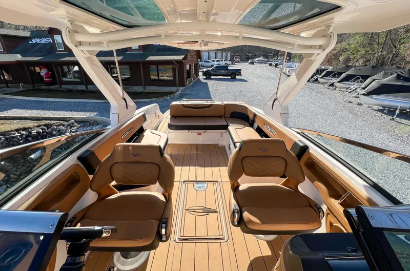 Slide: The Image of Interior of 2024 Chaparral 307 SSX boat with luxurious seating. - 22