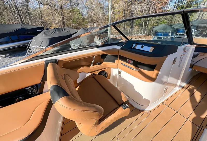 Slide: The Image of 2024 Chaparral 307 SSX interior with luxurious leather seating. - 23