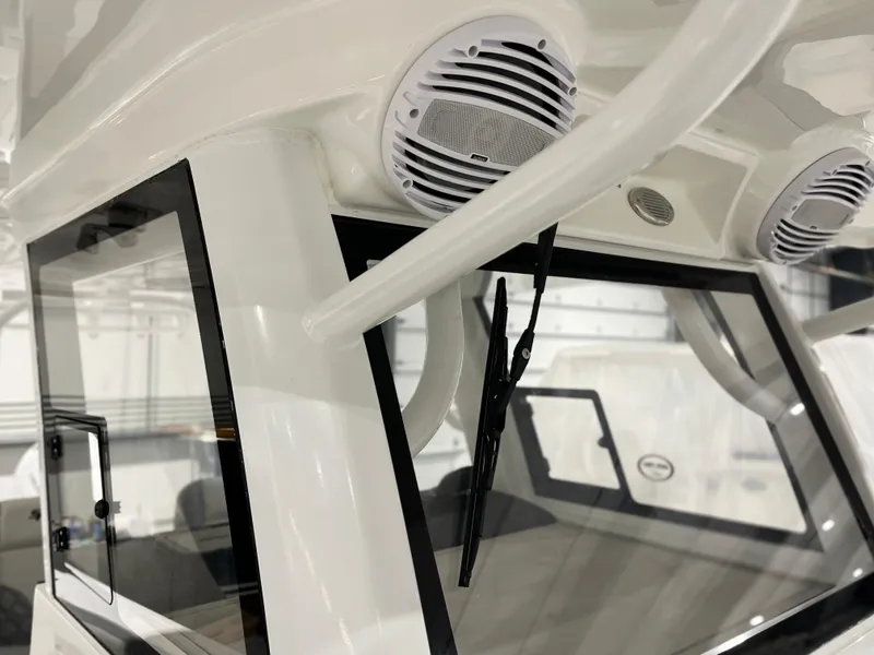 Slide: The Image of 2024 Sea Pro 322 DLX boat windshield and speakers. - 19