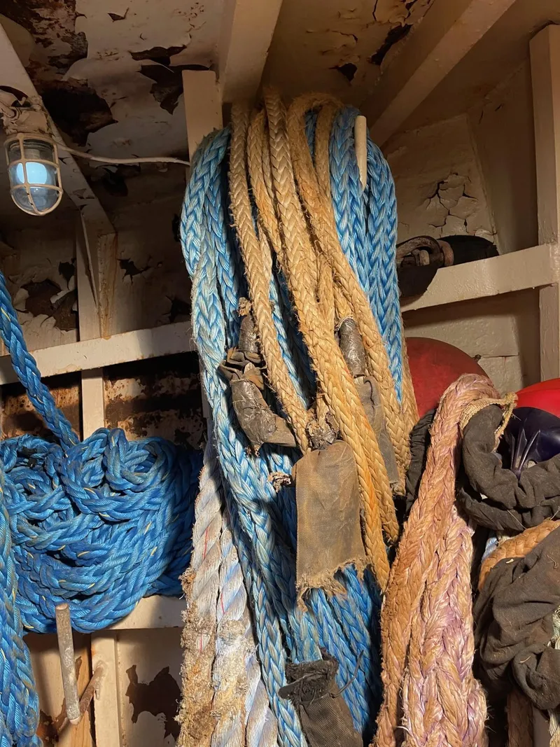 Slide: The Image of Ropes and equipment inside a 1961 Commercial Model Bow Tug boat. - 12