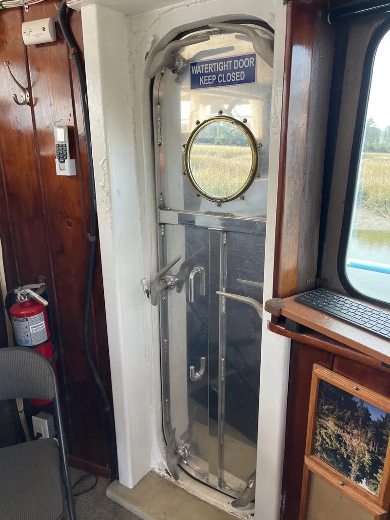 Slide: The Image of Watertight door on a 1961 Commercial Model Bow Tug boat. - 15