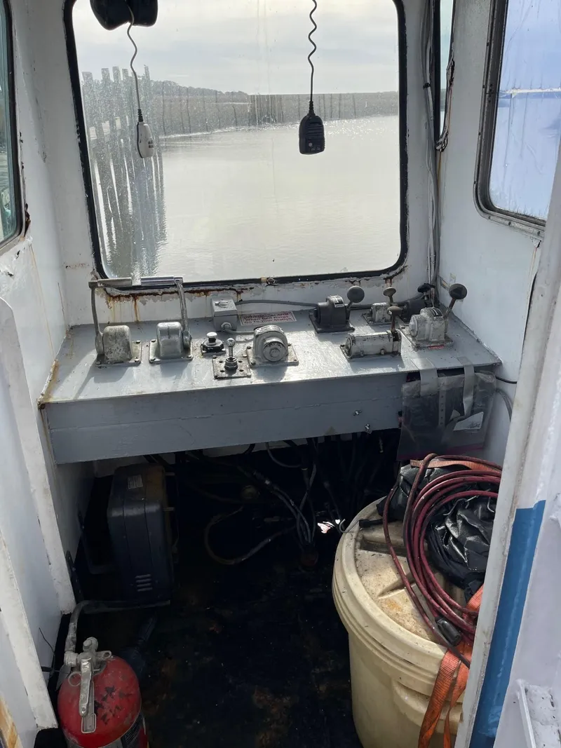 Slide: The Image of Control panel inside a 1961 Commercial Model Bow Tug boat. - 16