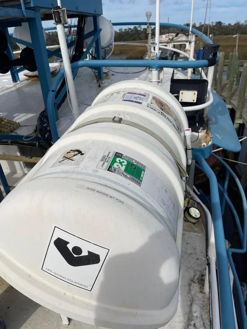 Slide: The Image of 1961 Commercial Model Bow Tug with safety equipment on deck. - 18
