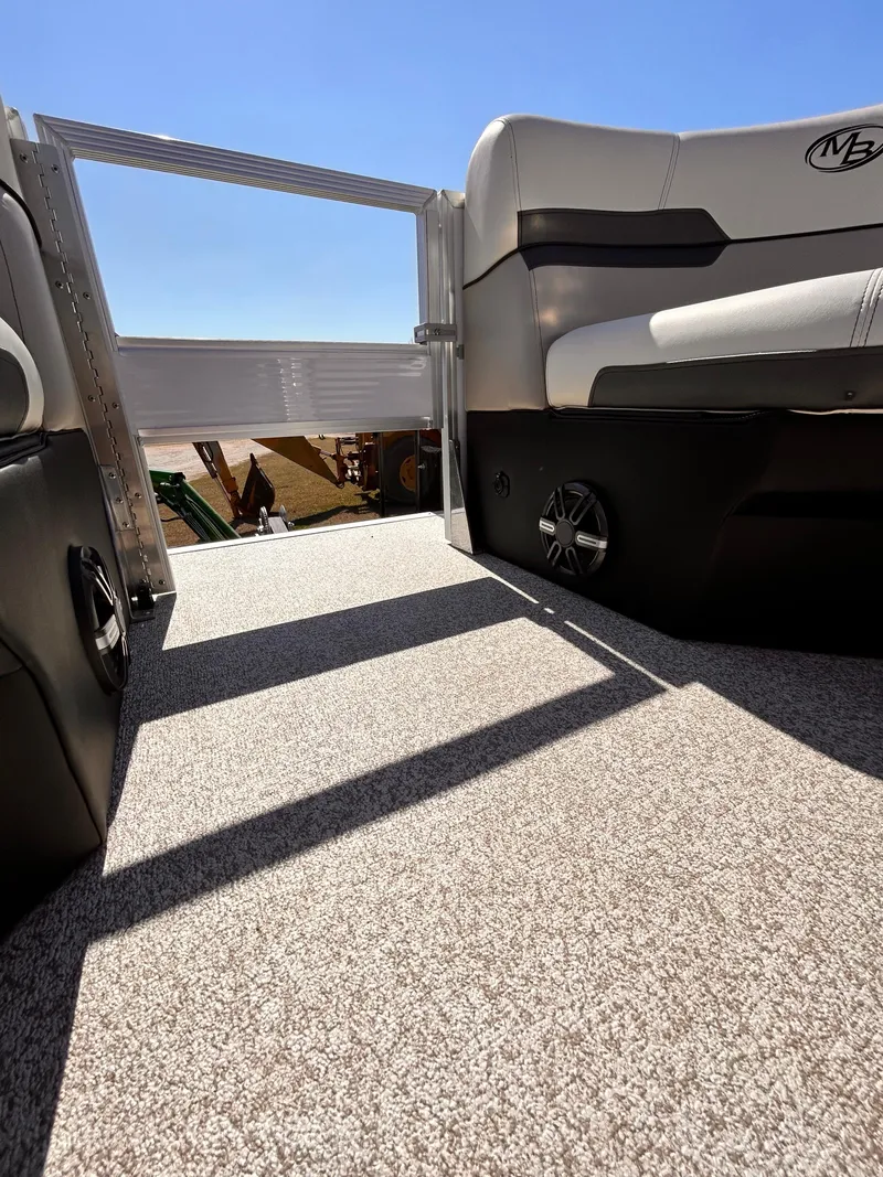 Slide: The Image of Montego Bay 8520 boat interior, 2023 model, featuring spacious seating and modern design. - 11