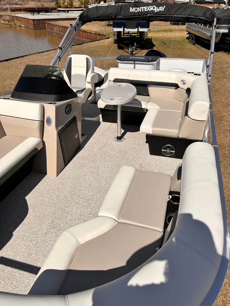 Slide: The Image of 2023 Montego Bay 8520 pontoon boat with spacious seating and modern design. - 14