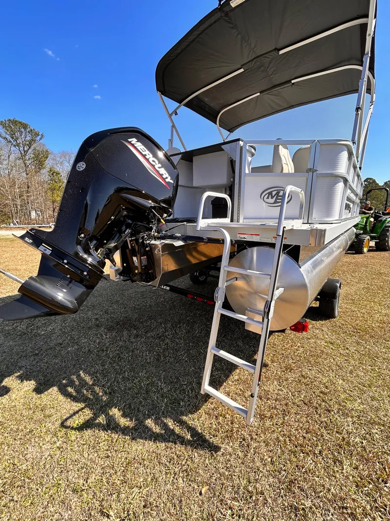 Slide: The Image of 2023 Montego Bay 8520 pontoon boat with Mercury outboard motor and ladder. - 4