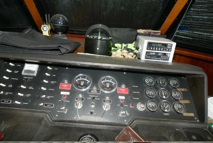 Slide: The Image of 1981 Blue Water Coastal Cruiser dashboard with gauges and controls. - 7