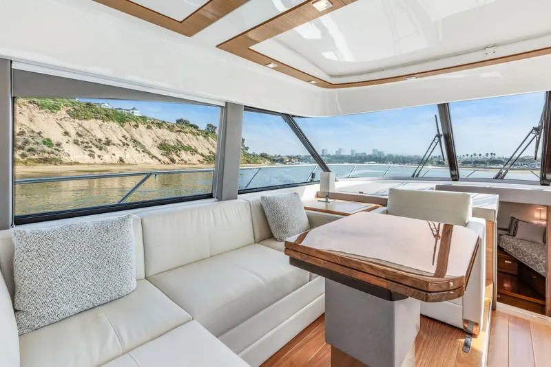Slide: The Image of Luxurious interior of 2022 Tiara Yachts 53 Coupe with scenic water view. - 32
