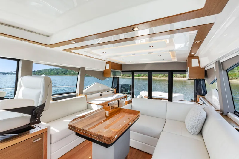 Slide: The Image of Luxurious interior of 2022 Tiara Yachts 53 Coupe with elegant seating and scenic views. - 36