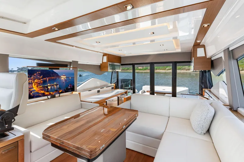 Slide: The Image of Luxurious interior of 2022 Tiara Yachts 53 Coupe with elegant seating and scenic views. - 37